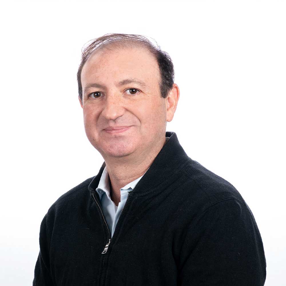 Jeff Goldman, General Manager at Ensorcell, a biotech and life sciences company, is seen facing the viewer.