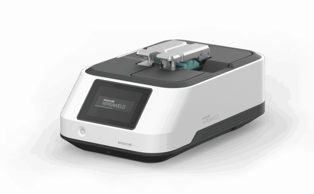 Ensorcell Versaweld device, a lightweight and battery powered bioprocessing sterile tube welder with a digital touchscreen interface sits in front of a transparent background.