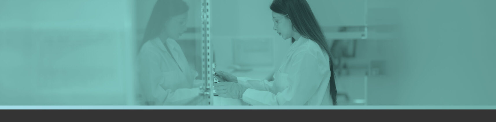 scientist in lab coat bioprocessing lab using bioprocessing tools that enable more flexible and efficient drug development workflows